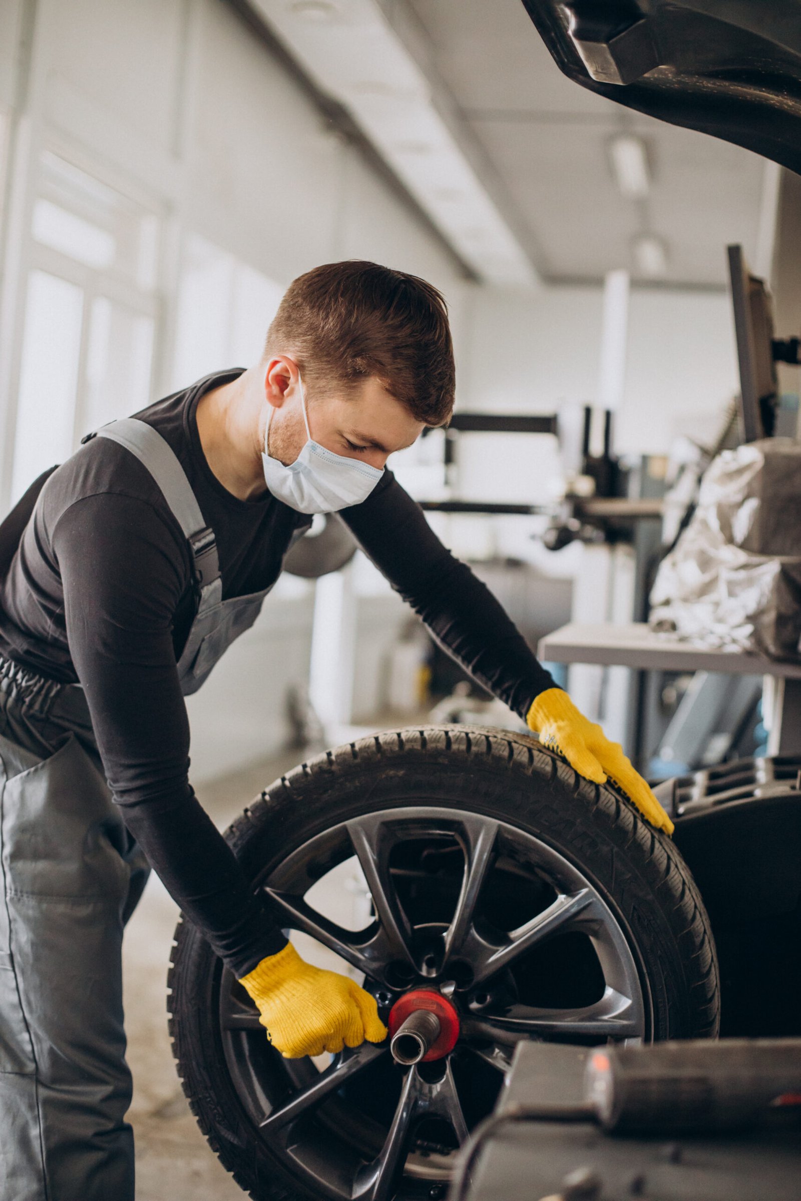 Barrack Road Tyres - Mechanic changing wheel